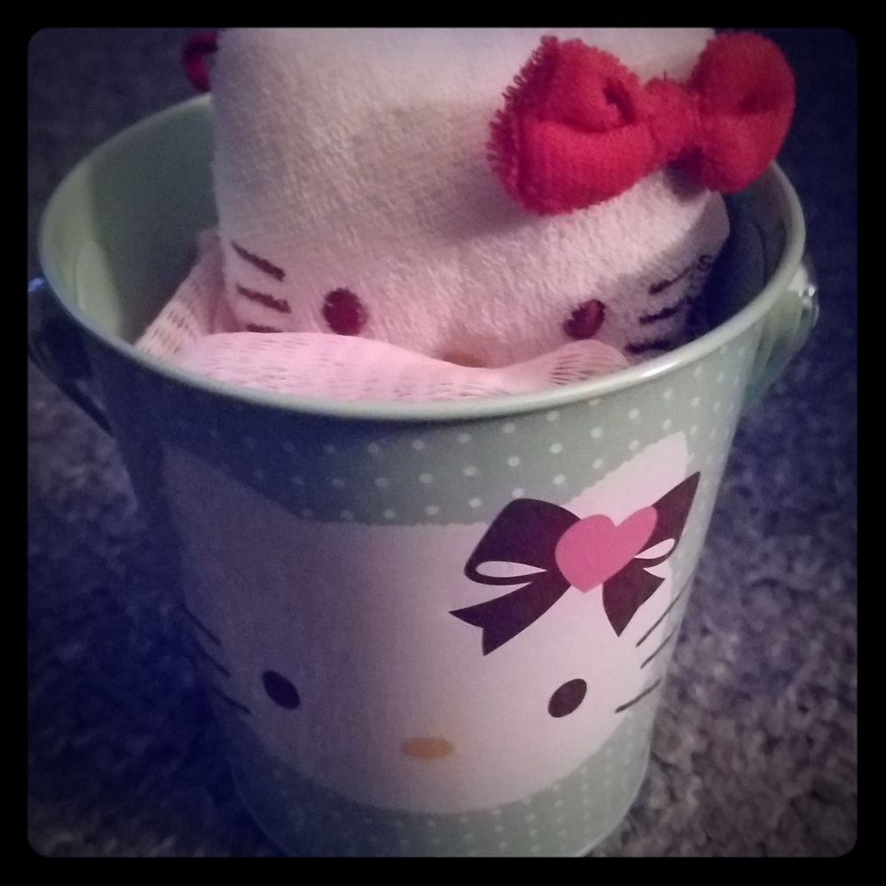 **SOLD**Hello Kitty Poof in a Tin Pail!